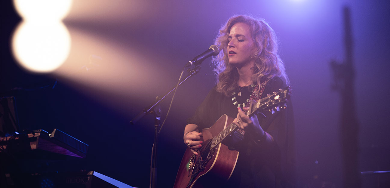 Woman playing guitar